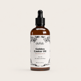 “DaFab Golden Castor Oil for skin and hair in amber glass bottle with dropper.”