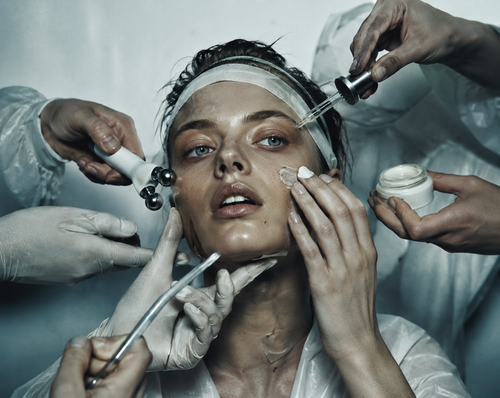 Editorial beauty campaign showing multiple cosmetic interventions around a woman’s face, representing the idea that beauty is biological and influenced by internal health, stress, sleep and nutrition.